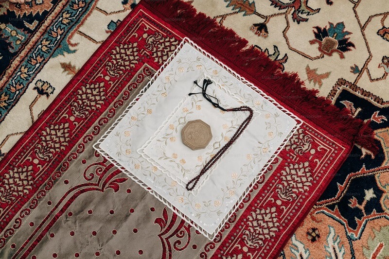 a piece of cloth on top of a rug