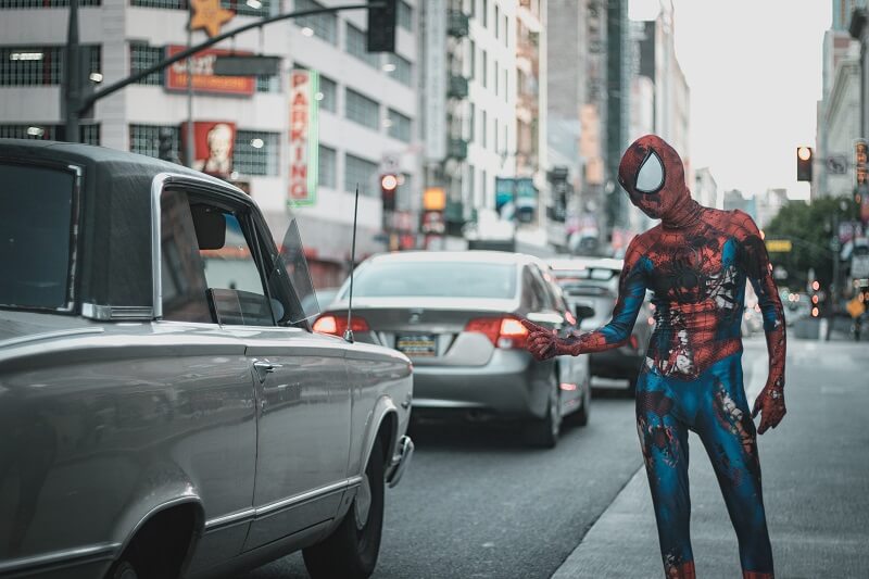 man wearing Spider-Man costume standing